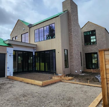 a house with a green roof and a green roof