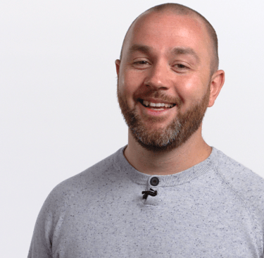 Stephen Long, smiling at the camera, on a white background
