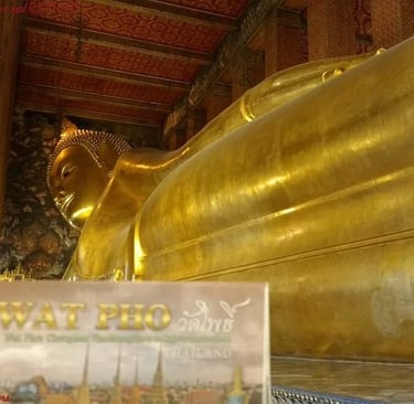 Reclining Buddha statue at Wat Pho temple in Bangkok, a famous cultural landmark