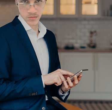 Businessman holding a smartphone