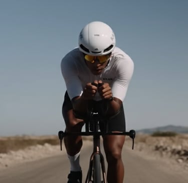 a man riding a TT bike in the desert