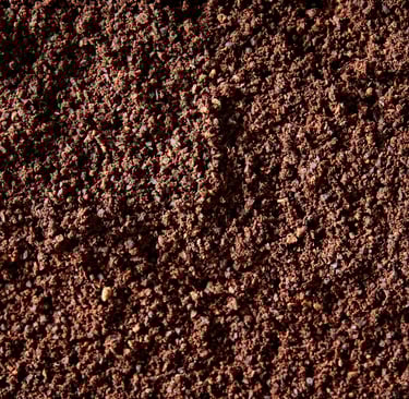 a close up of a dirt ground with a dirt ground
