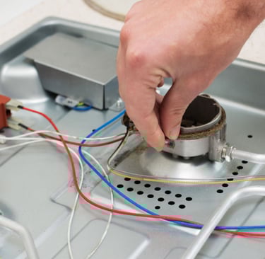 a person is holding a small device in their hand