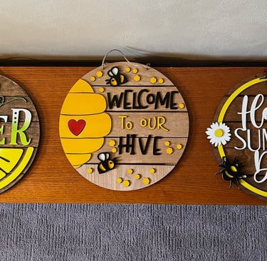 laser cut and colorfully painted wooden door or wall hangers
