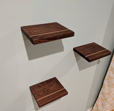 custom walnut floating shelves with maple band inlay for bedroom