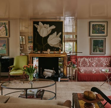 a living room with a couch and a table Nour Nagy Designs London interior Design