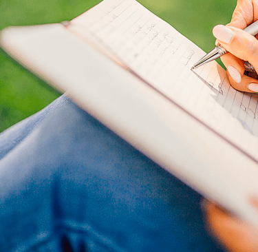 Writing in notebook