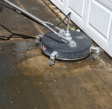 pressure washing to clean a garage