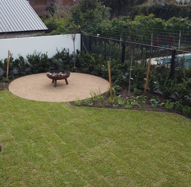 a bench in a backyard with a bench and a bench