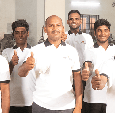 MP Asia Engineering Team With Thumbs Up posing on the plant