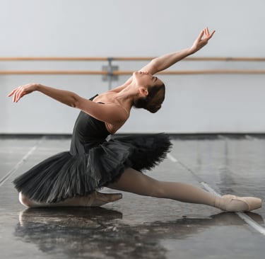 a woman in a black dress and a black skirt