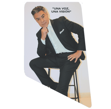 a man in a suit and tie is posing for a picture