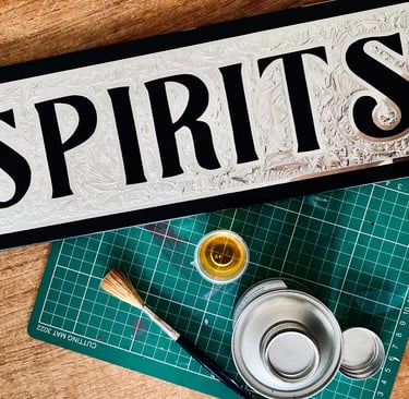 chipped glass spirits bar sign with 12ct white gold