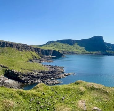 Neist Point with a view of a mountain range