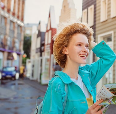 Solo female traveler enjoying city walk in Iceland