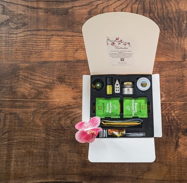 a box with a flower and a flower in it