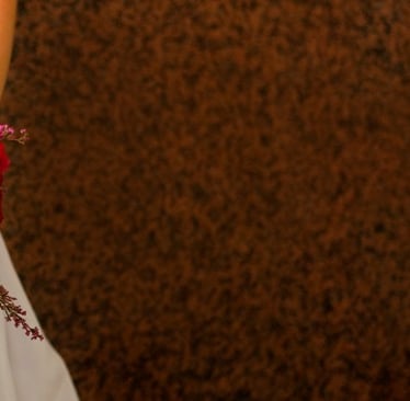 bride, red bouquet, detail, red stone wall