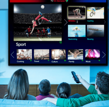 a family watching tv on tv