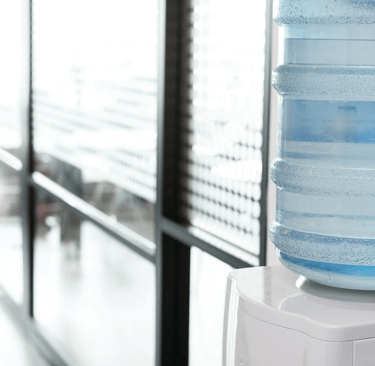 a water bottle with a water bottle on top of it