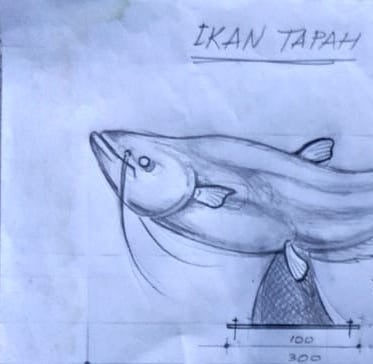 Patung ikan kuningan