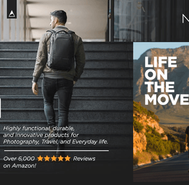 Nomatic backup with man walking up stairs and walking down the road