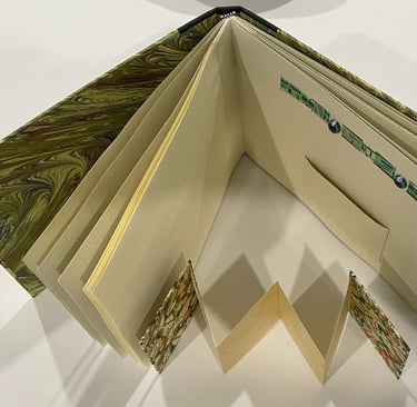 Album with marbled paper and decorative pages