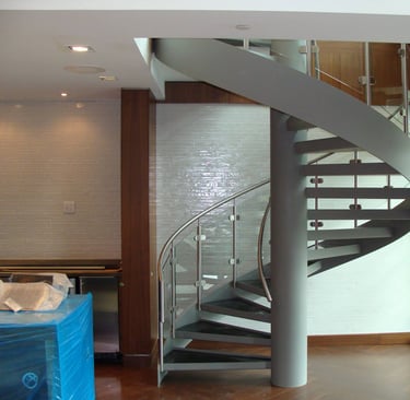 Spiral staircase at One Shurway, by Pengelly Iron Works