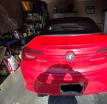 A red Buick car representing Jack’s Locksmith luxury car key and ignition service