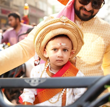 boy kid in maharastrian traditional outfit riding a motorbike in girgaon gudipadwa shobhayatra 2025