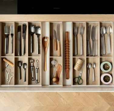 kitchen drawer with assorted kitchen utensils