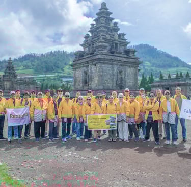 a group of people in yellow shirts and yellow shirts