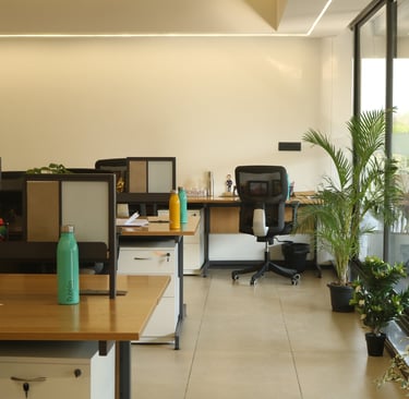 a room with a desk and a chair- Clayworks 4B