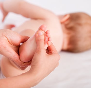 a baby's feet and feet are shown in this picture