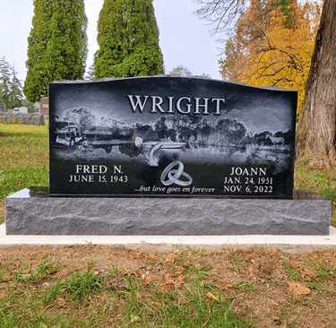 campanion headstone in jet black granite with laser etched artwork