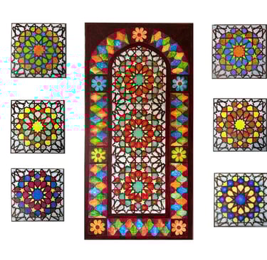 A set of one large 24x48 and 6 small 12x12 paintings of middle eastern stained glass windows