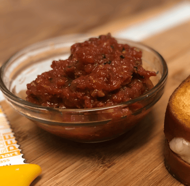 smokey roasted garlic marinara beside a pepperoni grilled cheese