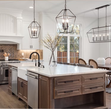 a kitchen with a table and chairs and a table
