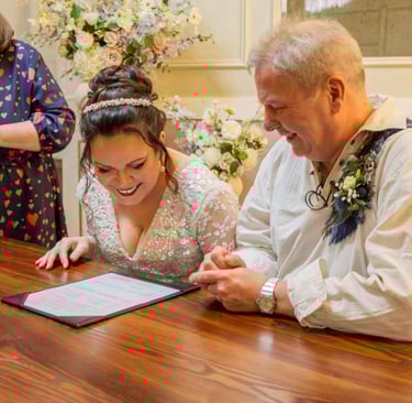 newly weds signing marriage register