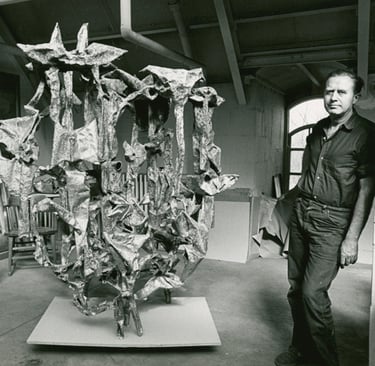 Sculptor Ibram Lassaw in 1963 with his sculpture titled Equinox. Photo taken at Duke University.