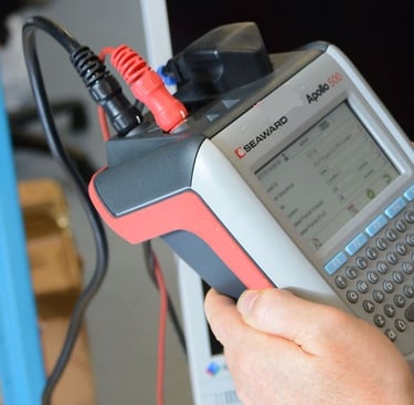 a man is holding a handheld computer