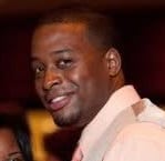 a man and woman dancing at a wedding