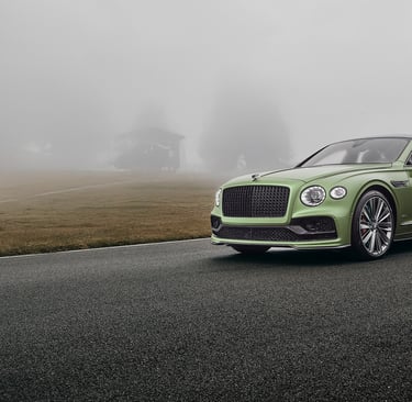a green bentley flying spur