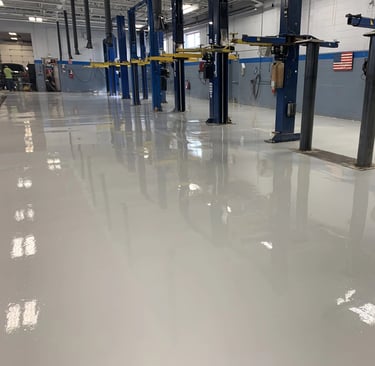 Solid color epoxy floor in commercial shop