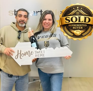 a man and woman holding a sign that says home sweet home sweet home sweet home