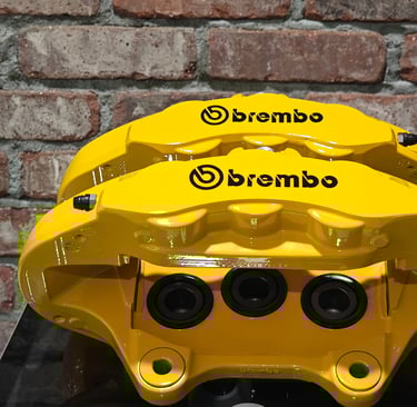 Jeep Trackhawk calipers restored in Signal Yellow powdercoat