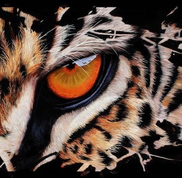 a lioness eye looking at prey reflected in eye