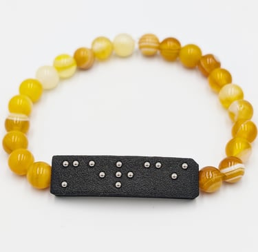 Bracelet perle Agate jaune chauffée, avec plaque braille Merci.