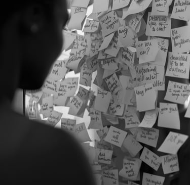 Editorial image showing affirmation notes on a mirror representing clarity and confidence building.