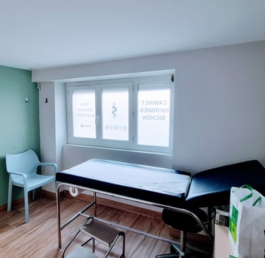 a bed in a room with a bed and a chair