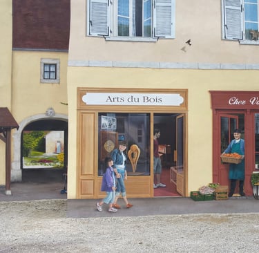 Des devantures et fenêtres en trompe-l'oeil sur façades à Moirans-en-Montagne